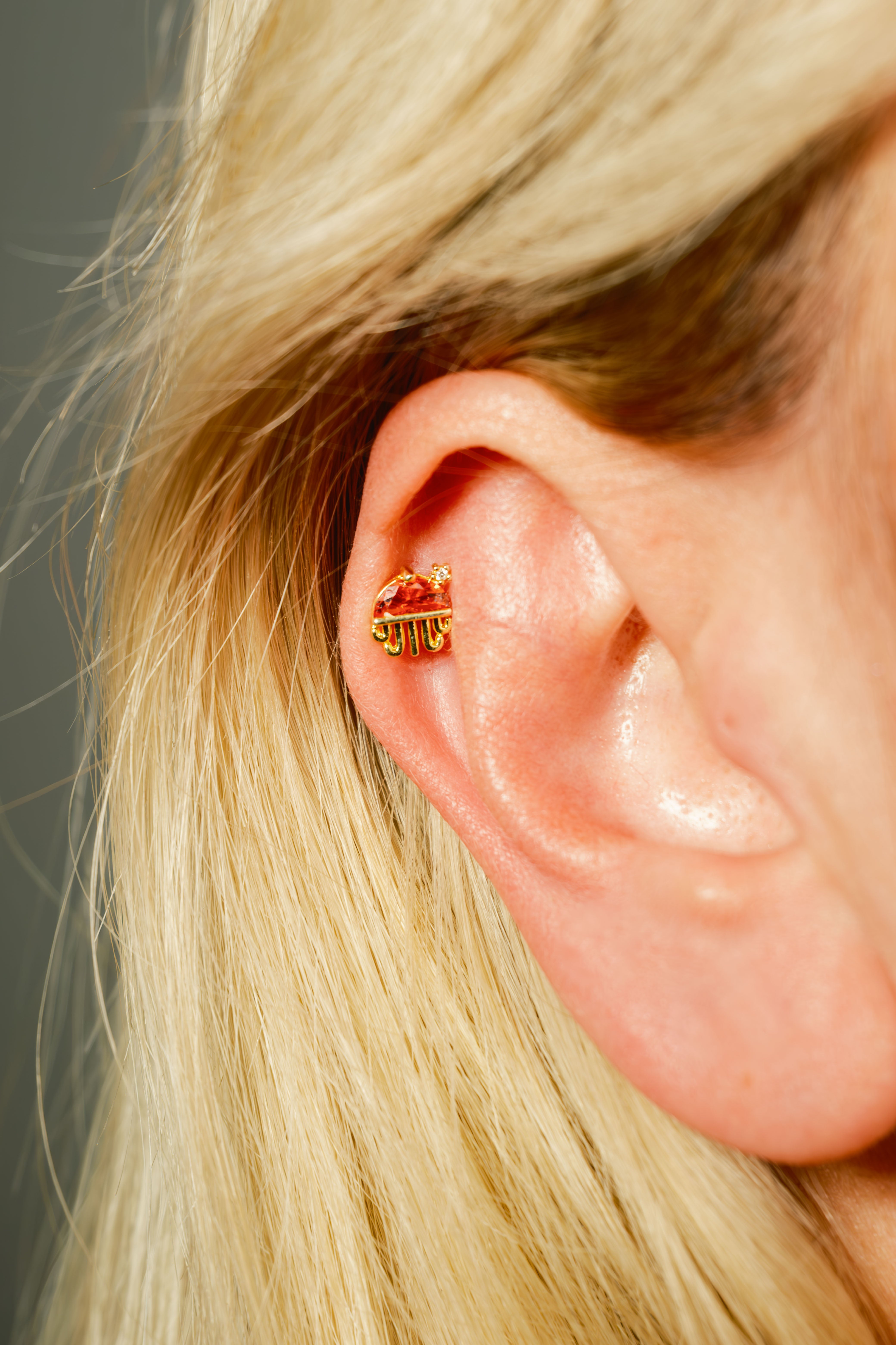 Orange Jellyfish Piercing